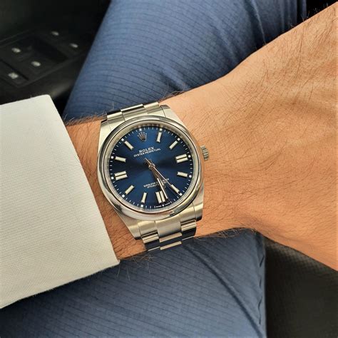 rolex oyster perpetual black 41mm|rolex 124300 blue.